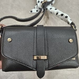 U.S. Polo Assn. Black Crossbody Bag with Polka Dot Accent